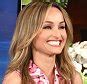 Giada De Laurentiis makes a splash in plunging blue bathing suit。